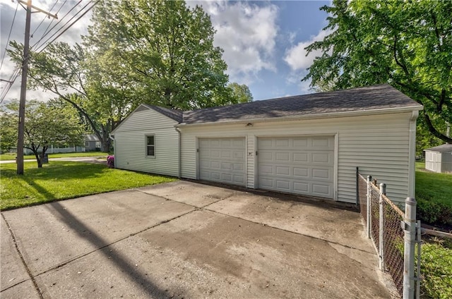 garage featuring fence