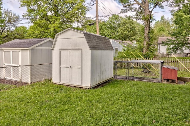 view of shed with fence