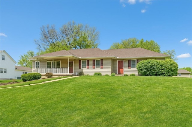 915 Walnut St, Valley Falls, KS 66088 - ranch-style home featuring covered porch and a front lawn