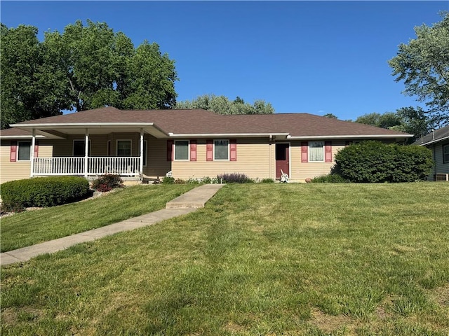 915 Walnut St, Valley Falls, KS 66088 - single story home with a front lawn and a porch