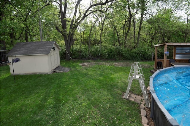 view of yard with a storage shed and an outbuilding