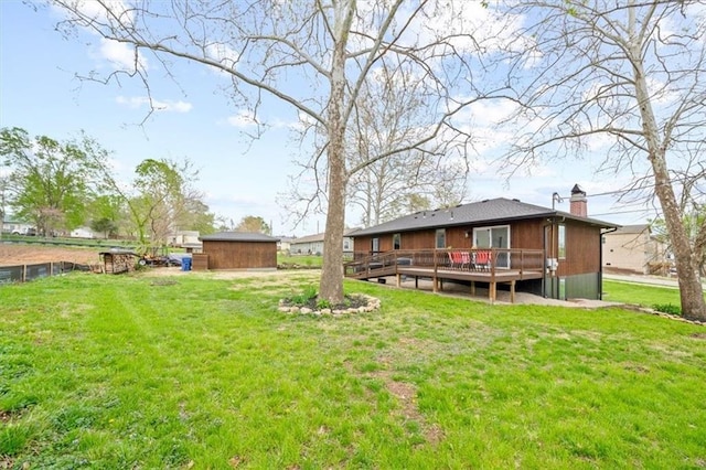 view of yard with a deck