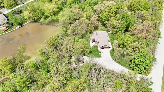 drone / aerial view with a water view