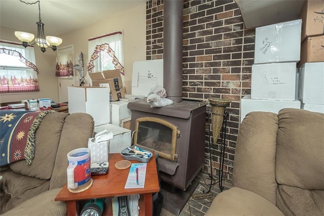 living area with a wealth of natural light and a wood stove
