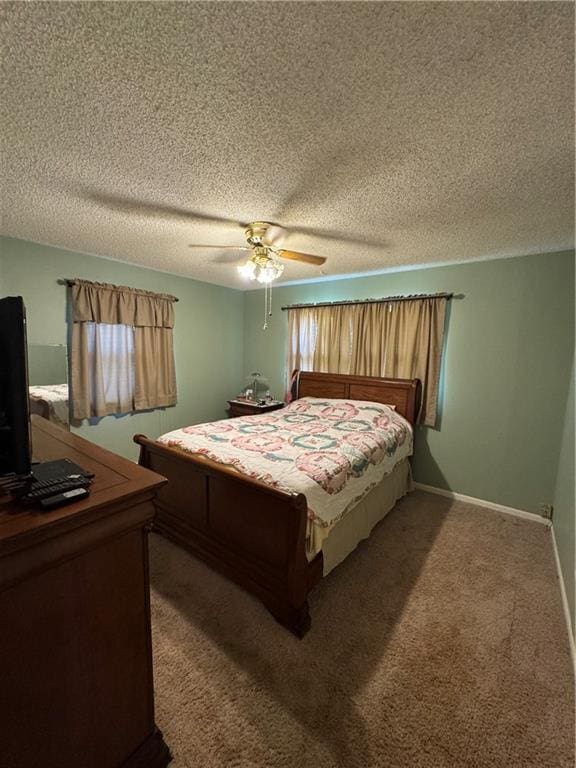 8833 Hickory Ln, Ozawkie, KS 66070 - carpeted bedroom with a textured ceiling and ceiling fan