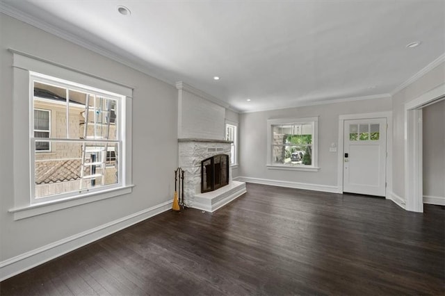 12 E 57th St, Kansas City, MO 64113 - unfurnished living room with dark wood-style floors, a fireplace, ornamental molding, baseboards, and recessed lighting