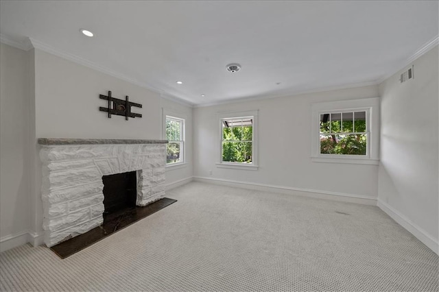 12 E 57th St, Kansas City, MO 64113 - unfurnished living room featuring light carpet, a stone fireplace, baseboards, ornamental molding, and recessed lighting