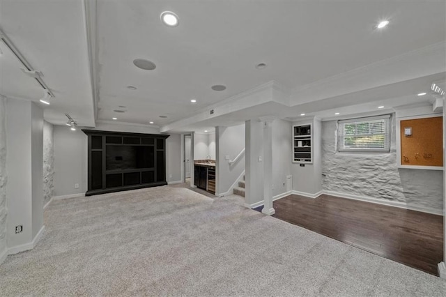 12 E 57th St, Kansas City, MO 64113 - unfurnished living room featuring wood finished floors, baseboards, ornamental molding, stairs, and recessed lighting