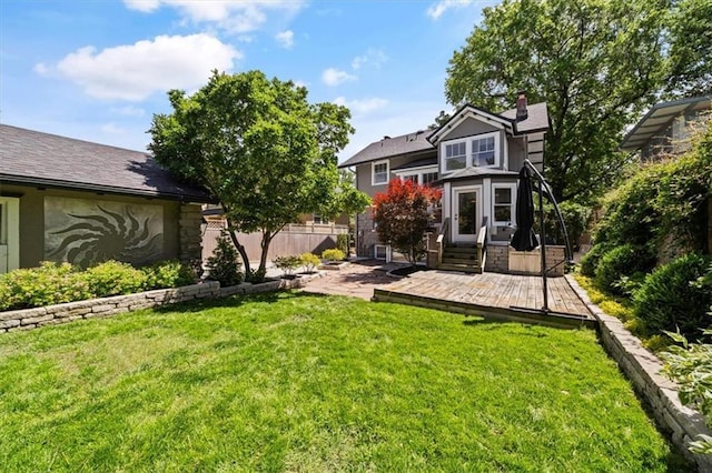 12 E 57th St, Kansas City, MO 64113 - rear view of house featuring a deck and stone siding