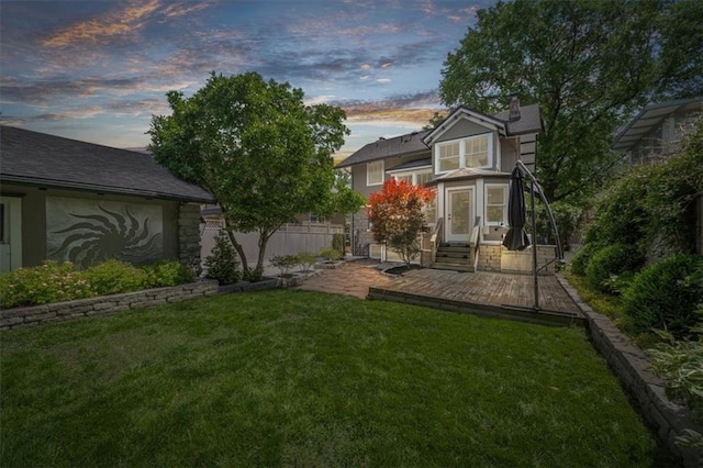 12 E 57th St, Kansas City, MO 64113 - yard at dusk featuring entry steps