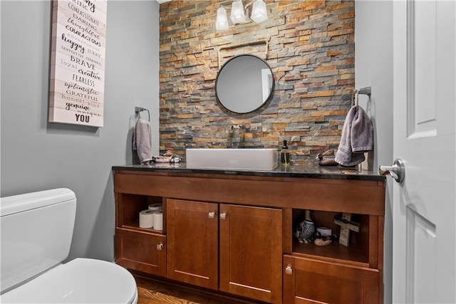 3610 NE Basswood Dr, Lees Summit, MO 64064 - bathroom with vanity, toilet, and wood finished floors