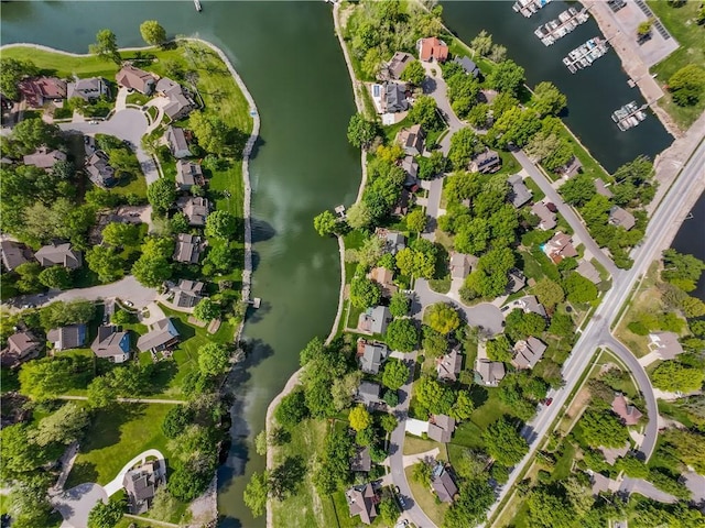 3610 NE Basswood Dr, Lees Summit, MO 64064 - aerial perspective of suburban area featuring a nearby body of water