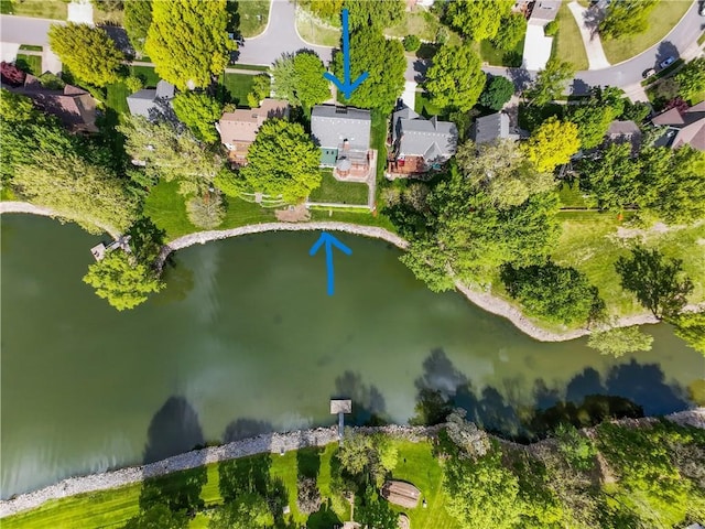 3610 NE Basswood Dr, Lees Summit, MO 64064 - aerial view of residential area with a large body of water