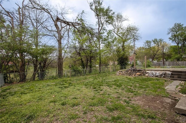 view of yard with fence