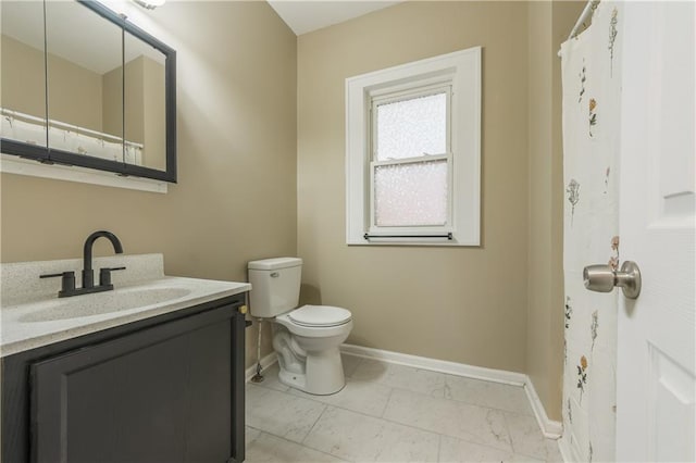 full bath with baseboards, toilet, vanity, and marble finish floor