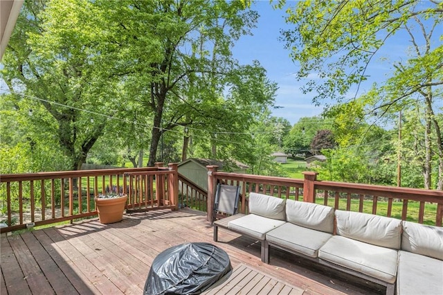 wooden deck featuring an outdoor hangout area