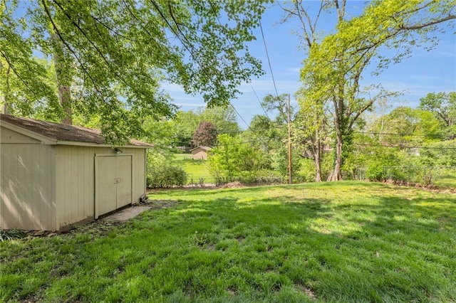 view of yard with a storage unit and an outdoor structure