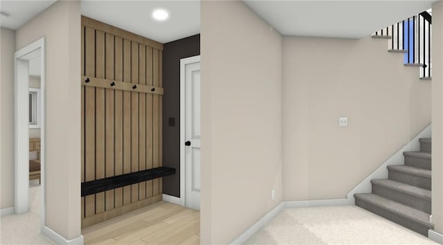 18180 NW 127th St, Platte City, MO 64079 - stairway with baseboards, recessed lighting, and wood finished floors