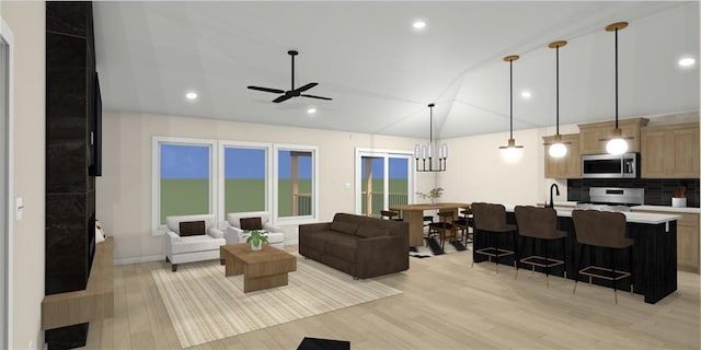 18180 NW 127th St, Platte City, MO 64079 - living room featuring recessed lighting, light wood-style flooring, ceiling fan, and lofted ceiling