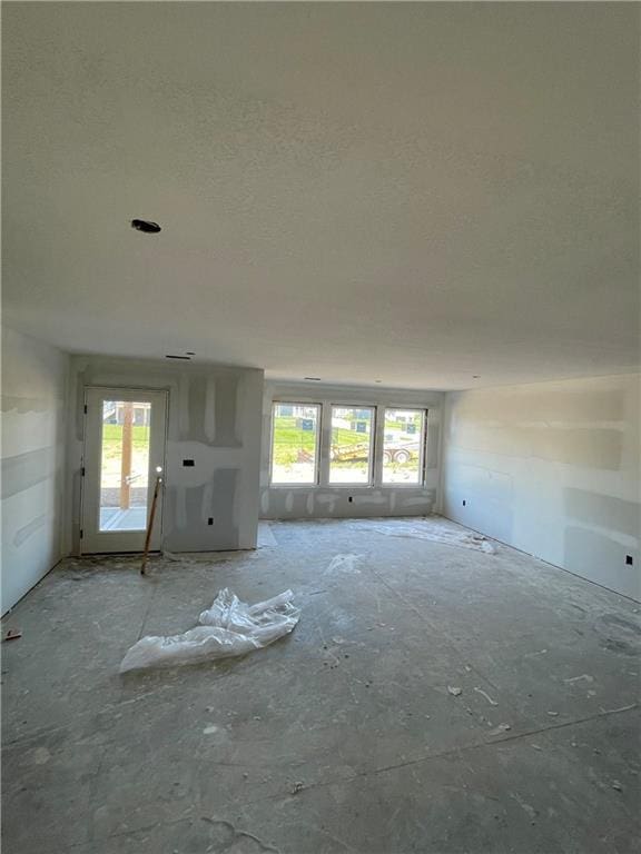 1226 NE 122nd St, Kansas City, MO 64165 - spare room featuring healthy amount of natural light