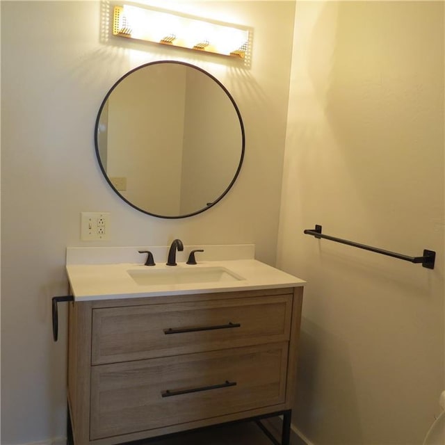 101 E 3rd St, Stanberry, MO 64489 - bathroom featuring baseboards and vanity
