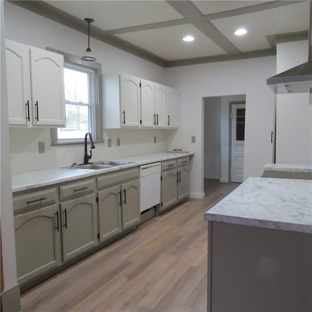 101 E 3rd St, Stanberry, MO 64489 - kitchen featuring white cabinetry, a sink, light countertops, white dishwasher, and light wood finished floors