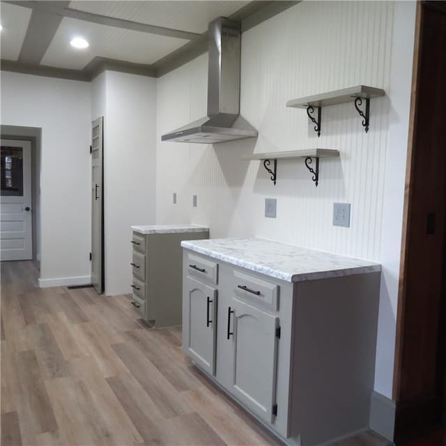 101 E 3rd St, Stanberry, MO 64489 - kitchen with recessed lighting, open shelves, light wood-style flooring, wall chimney range hood, and light countertops