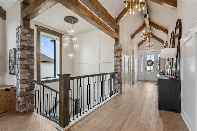 325 Ambersham Dr, Lees Summit, MO 64081 - hallway with a chandelier, hardwood / wood-style flooring, and an upstairs landing