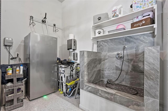 325 Ambersham Dr, Lees Summit, MO 64081 - bathroom with speckled floor and a walk in shower