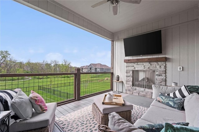 325 Ambersham Dr, Lees Summit, MO 64081 - wooden deck featuring an outdoor living space with a fireplace, ceiling fan, and a yard