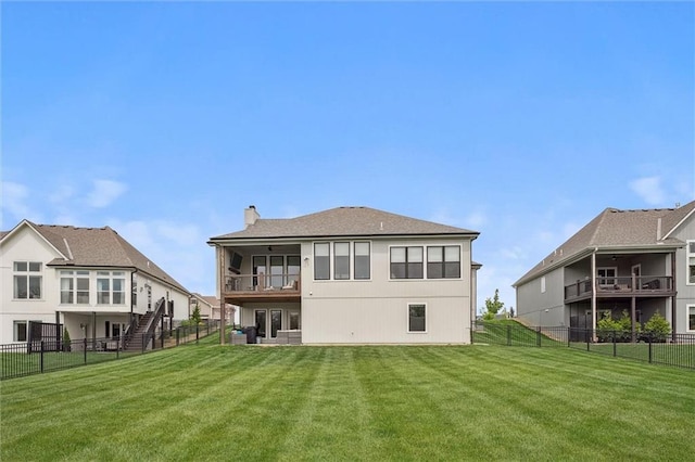 325 Ambersham Dr, Lees Summit, MO 64081 - rear view of house with a chimney, stairway, and a balcony