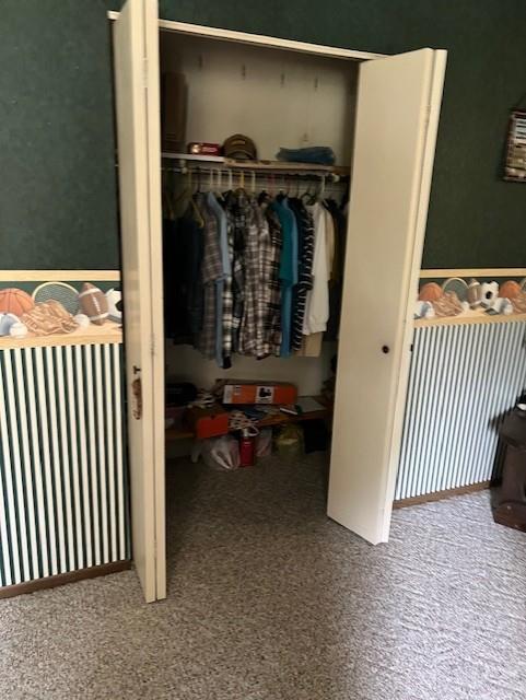 closet featuring radiator heating unit