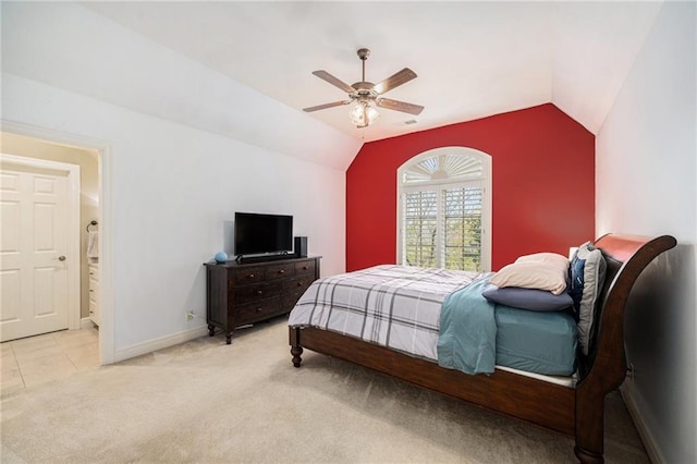 bedroom featuring carpet floors, baseboards, ceiling fan, and vaulted ceiling