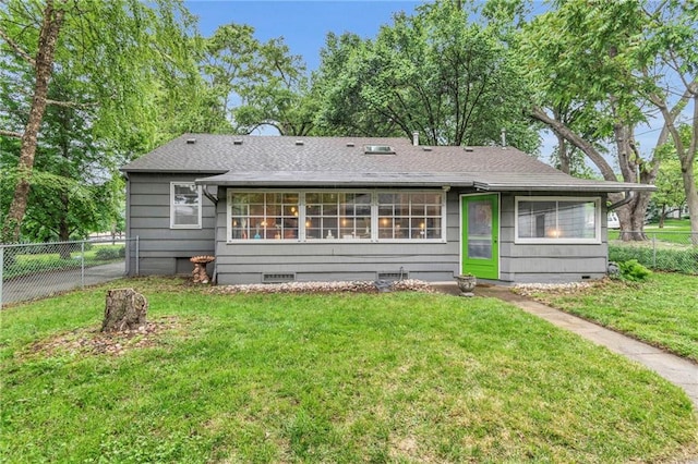 back of property featuring crawl space and a shingled roof