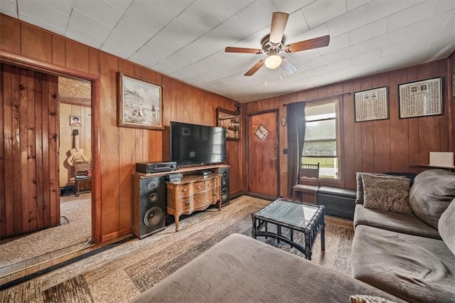 6425 N Edison Ave, Kansas City, MO 64151 - living room with wood walls and ceiling fan