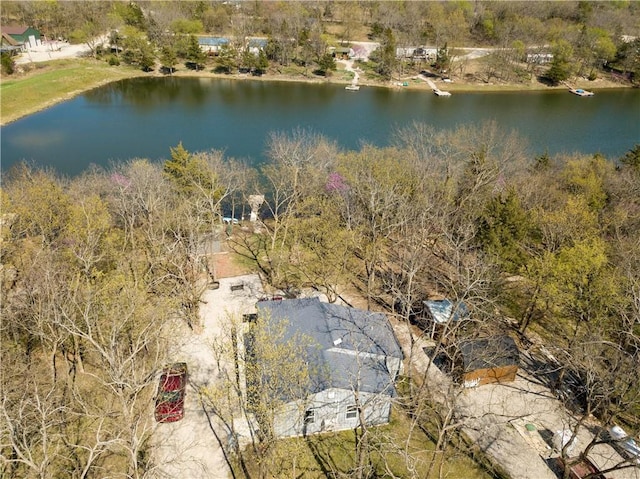 58 E Sugar Lake Cv, Mound City, KS 66056 - birds eye view of property featuring a water view