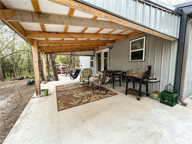 58 E Sugar Lake Cv, Mound City, KS 66056 - view of patio / terrace with a grill