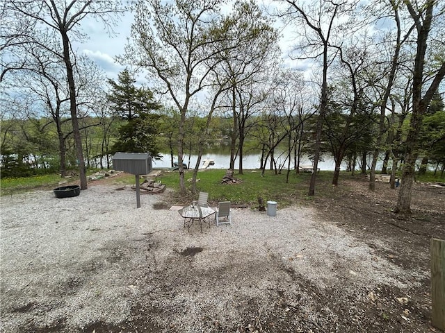 58 E Sugar Lake Cv, Mound City, KS 66056 - view of yard featuring a water view