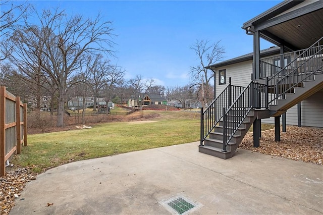 view of yard featuring stairs and a patio area