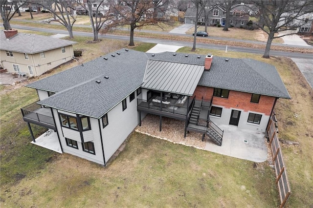 drone / aerial view with a residential view