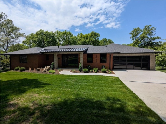 9628 Meadow Ln, Leawood, KS 66206 - view of front of house with an attached garage, concrete driveway, a front lawn, and a standing seam roof