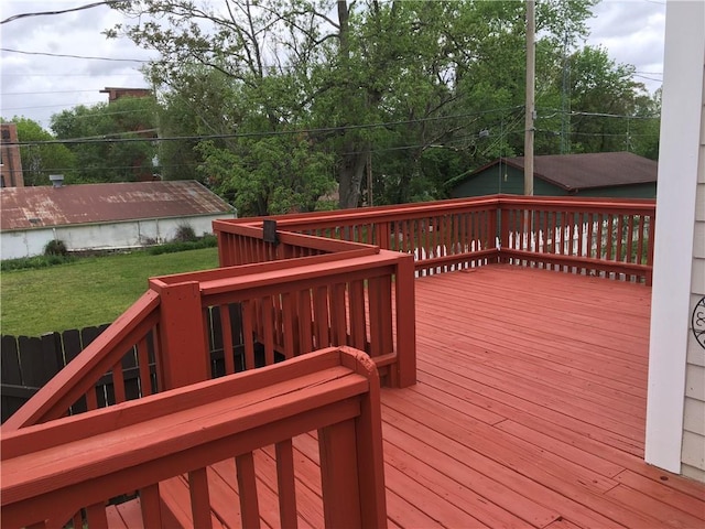 deck featuring a lawn