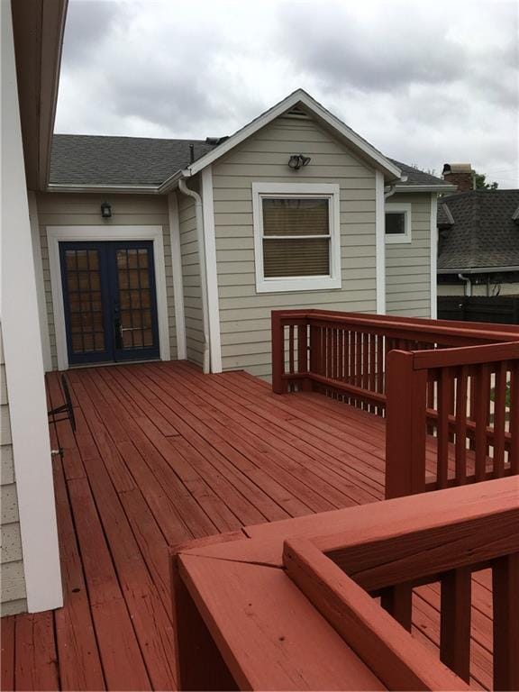 wooden terrace featuring french doors