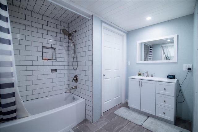 full bath featuring vanity, recessed lighting, and shower / tub combo