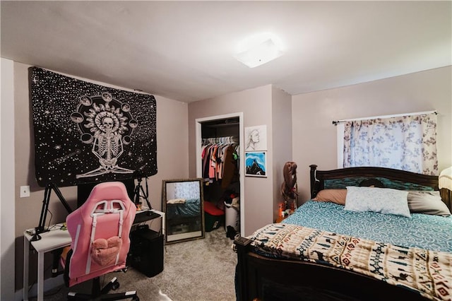 carpeted bedroom featuring a closet and a spacious closet