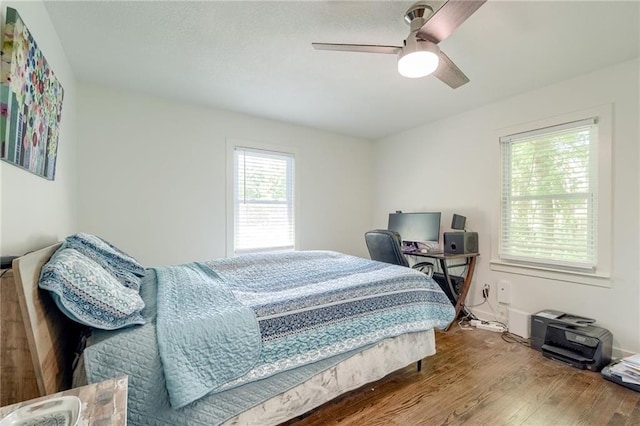 7636 Windsor St, Prairie Village, KS 66208 - bedroom with wood finished floors and a ceiling fan