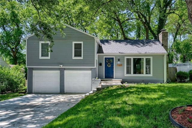 7636 Windsor St, Prairie Village, KS 66208 - tri-level home featuring a chimney, an attached garage, driveway, and roof with shingles