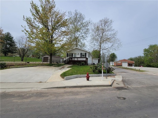 601 S 24th St, Lexington, MO 64067 - bungalow-style house with driveway and an outdoor structure