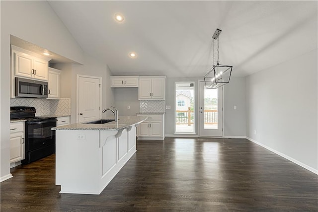 11802 N Bellaire Ave, Kansas City, MO 64156 - kitchen featuring stainless steel microwave, black electric range, a sink, backsplash, and a chandelier