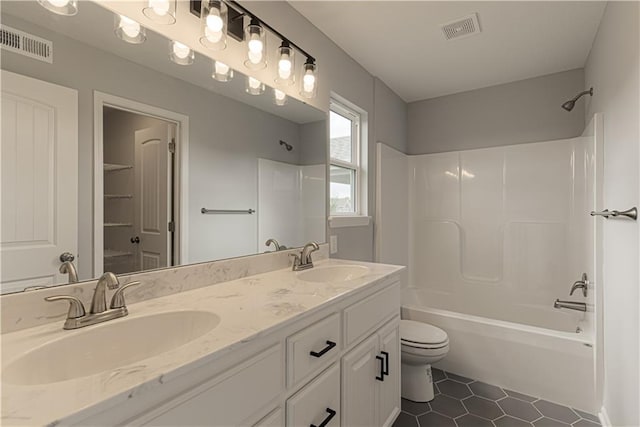 11802 N Bellaire Ave, Kansas City, MO 64156 - bathroom with toilet, bathing tub / shower combination, tile patterned flooring, and double vanity